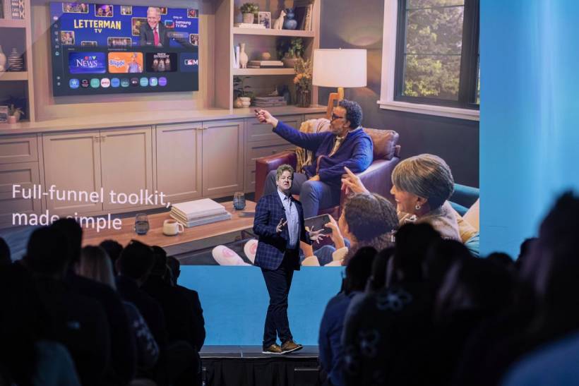 man presenting on stage